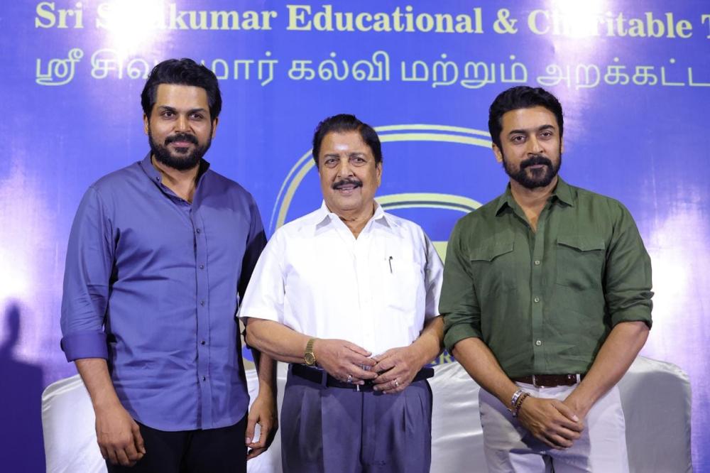 agaram-trust-actor-sivakumar-surya-karthi-photos